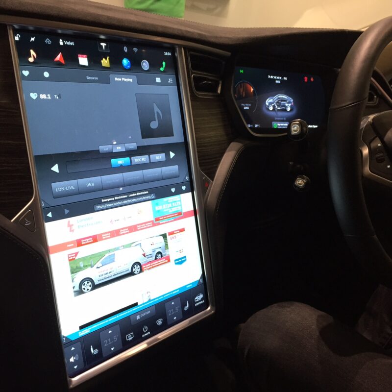 A picture showing the touchscreen dashboard of a Tesla that is on the London Electricians website