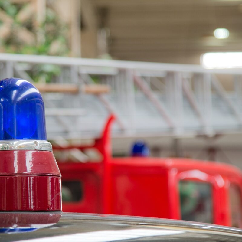 A picture showing a close up of the blue light of an emergency vehicle, a reminder that London properties need fire alarm certificates